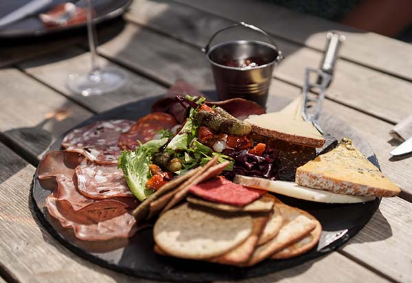 Mixed meats on a plate alfresco